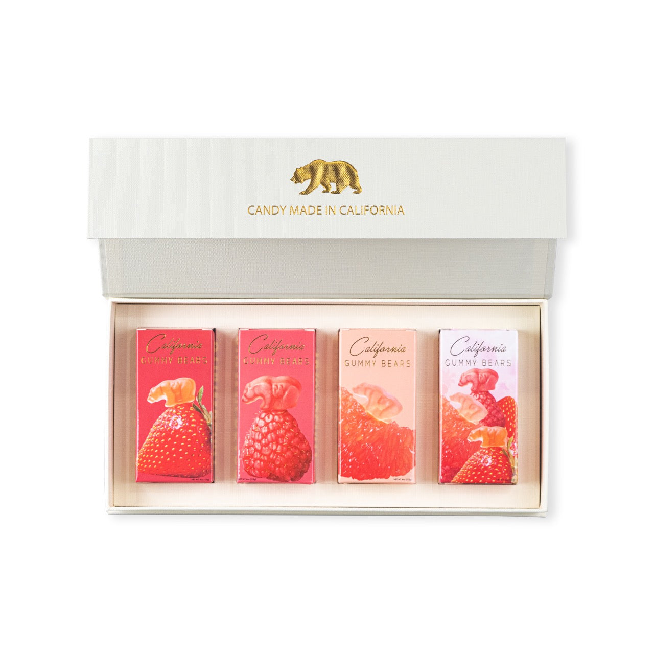 A gift box set containing various flavors of California Gummy Bears displayed in an open white box with gold details.